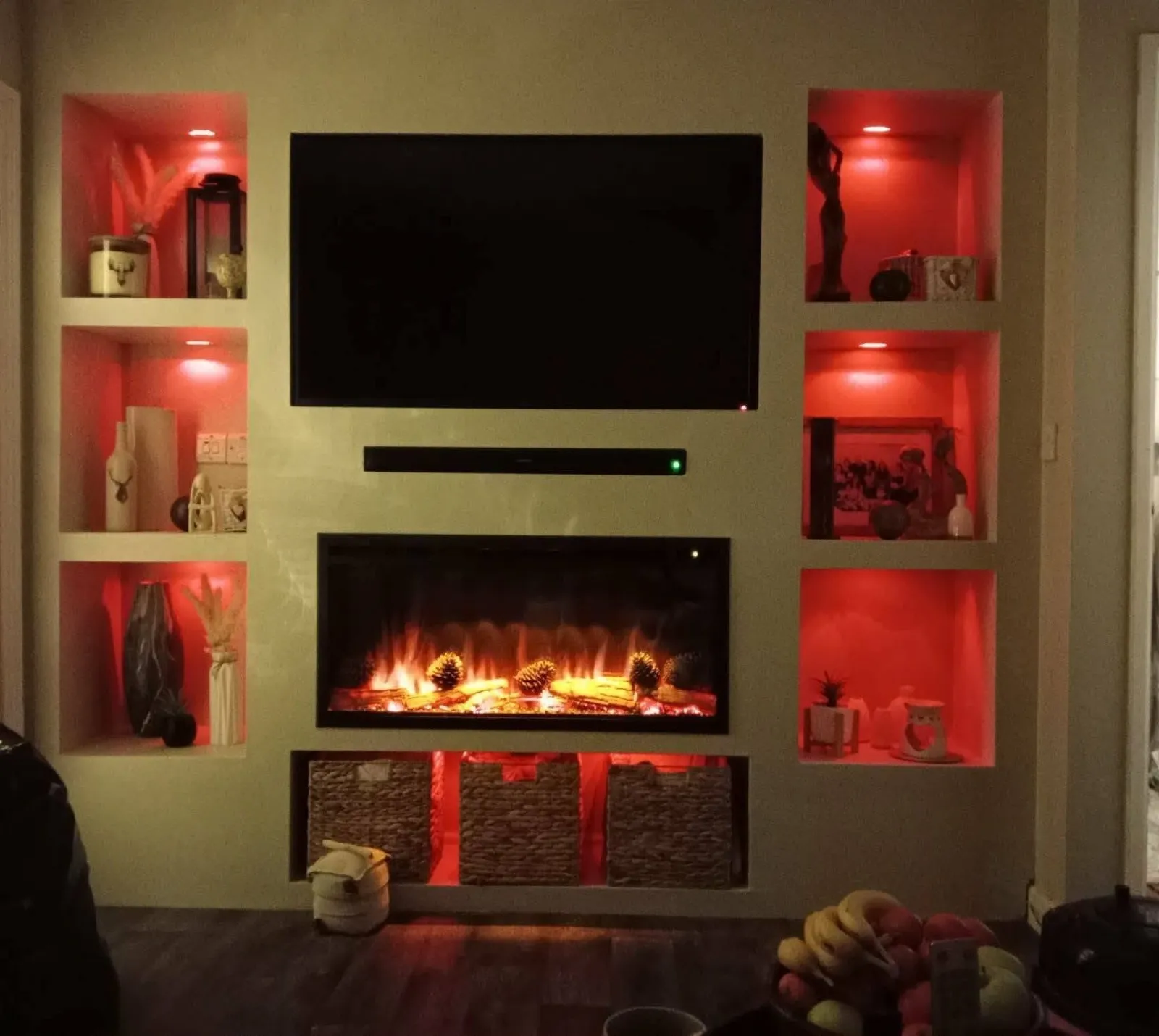 Media wall with inset fire and lit shelving